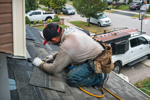Professional Roof Repair technician working in Manns Choice, PA